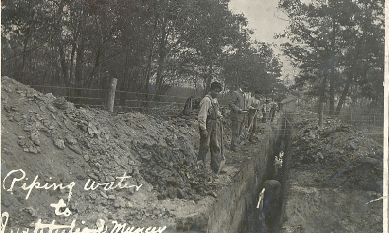 Students digging ditches for water pipes, Mount Elgin Insititute.