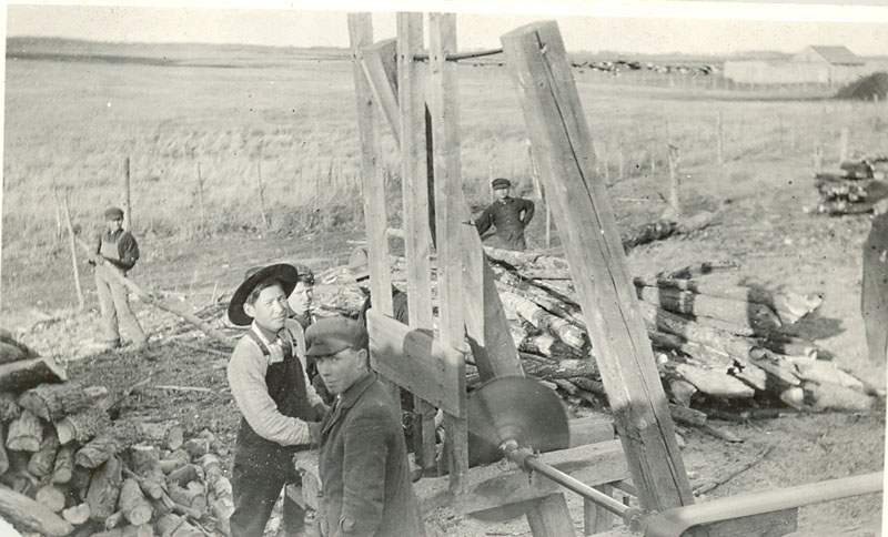 Students cutting wood, Red Deer Institute.