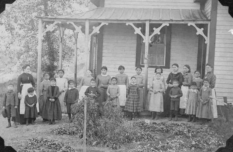 The first Crosby Girls' Home, resident and staff.