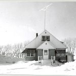 Exterior shot of the Principal's residence at Portage la Prairie Residential School in winter.