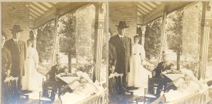 Staff on the porch of Mount Elgin Institute. Stereograph.