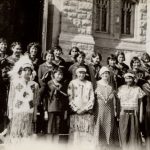 Group picture of choir in front of a stone building with inset of choir director