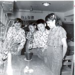 Four students in a classroom at Norway House Indian Residential School.
