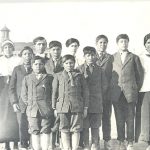 The reverend with children from Island Lake who attend Norway House Indian Residential School.