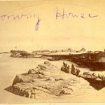 long distance view of Norway House showing various buildings. Title of 
