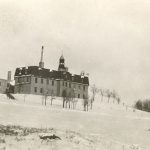 Brandon Residential School, on top of a hill, taken in winter.