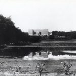 Brandon Residential School with surrounding lake, fields and trees.
