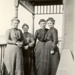 Four staff members from Crosby Girls' Home on the front porch.