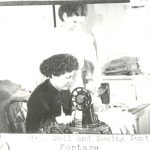 Staff sitting at sewing machine instructing standing child, caption reads 
