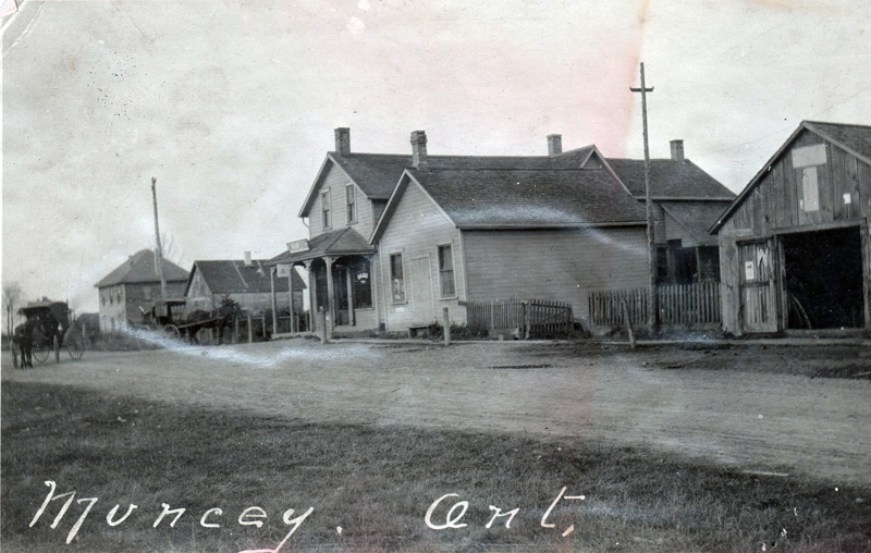 [Muncey, Ontario. Image of residential buildings, with some horses