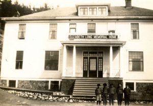 Elizabeth Long Memorial Home, Kitamaat, with five boys standing out front.