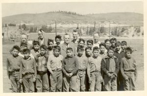 Boys and teachers, Morley Indian Residential School, circa 1940.