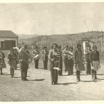 School band standing on road in formation