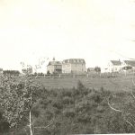 View of Red Deer Industrial Institute buildings from faraway field