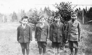 4 boys in suits, Alberni Indian Residential School