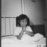 Little girl saying prayers
