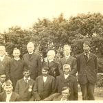 Rev. T. Ferrier, Rev. S.D. Gaudin, Rev. S.D. Chown, and Rev. J. Maclean with members of the Norway House United Church, now called the Kinosao Sipi Keenanow United Church, posed outside for a group portrait.